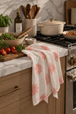 Coastal Coral Floral Towel styled in a warm kitchen