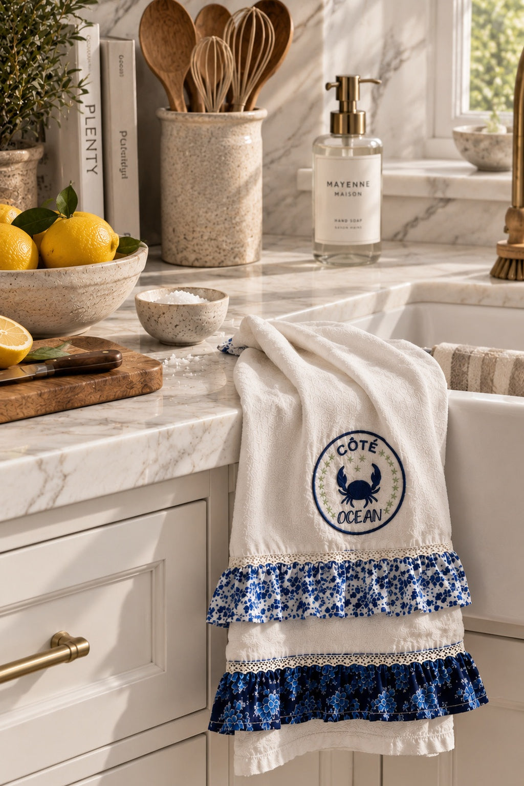 Côte Océan Ruffle Towel styled in a white marble kitchen