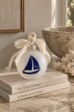 Frosted glass sailboat holiday ornament with hand frayed ribbon