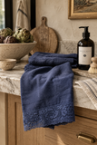 Hand-dyed linen kitchen towel in Ocean Navy with crochet edge