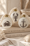 Hand-faded frosted glass nautical ornament set with crab lobster and anchor