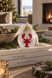 Frosted glass lobster holiday ornament with off-white ribbon