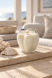 Bergamot soy candle in clear embossed glass vessel