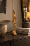 Mayenne Maison vintage hand-carved wooden figure styled on a dark wood console