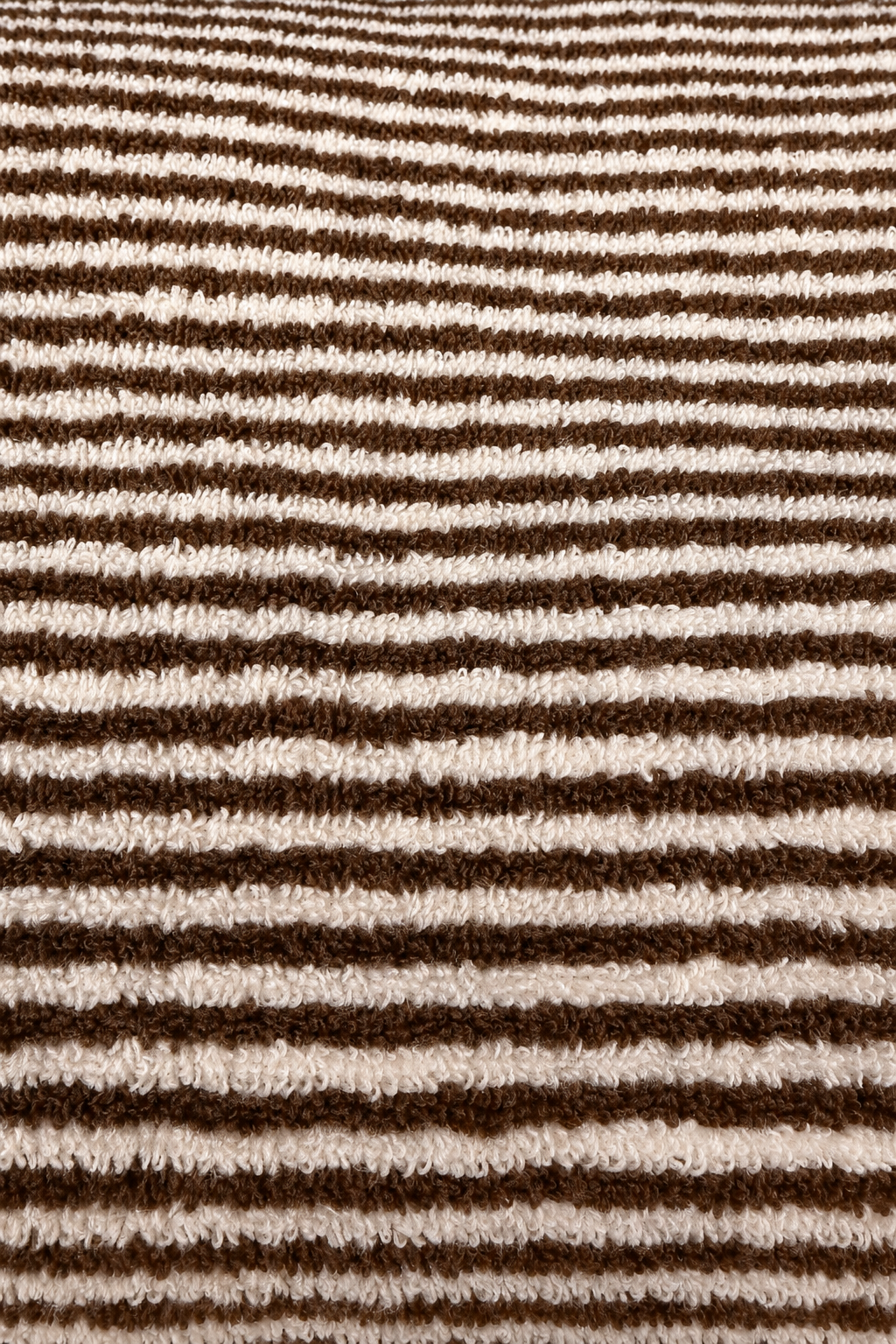 Close-up of smoked brown and ivory striped terry towel texture
