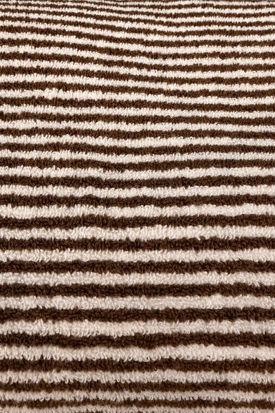 Close-up of smoked brown and ivory striped terry towel texture