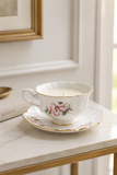 Vintage white china teacup and saucer soy candle with pink floral motif and gold trim